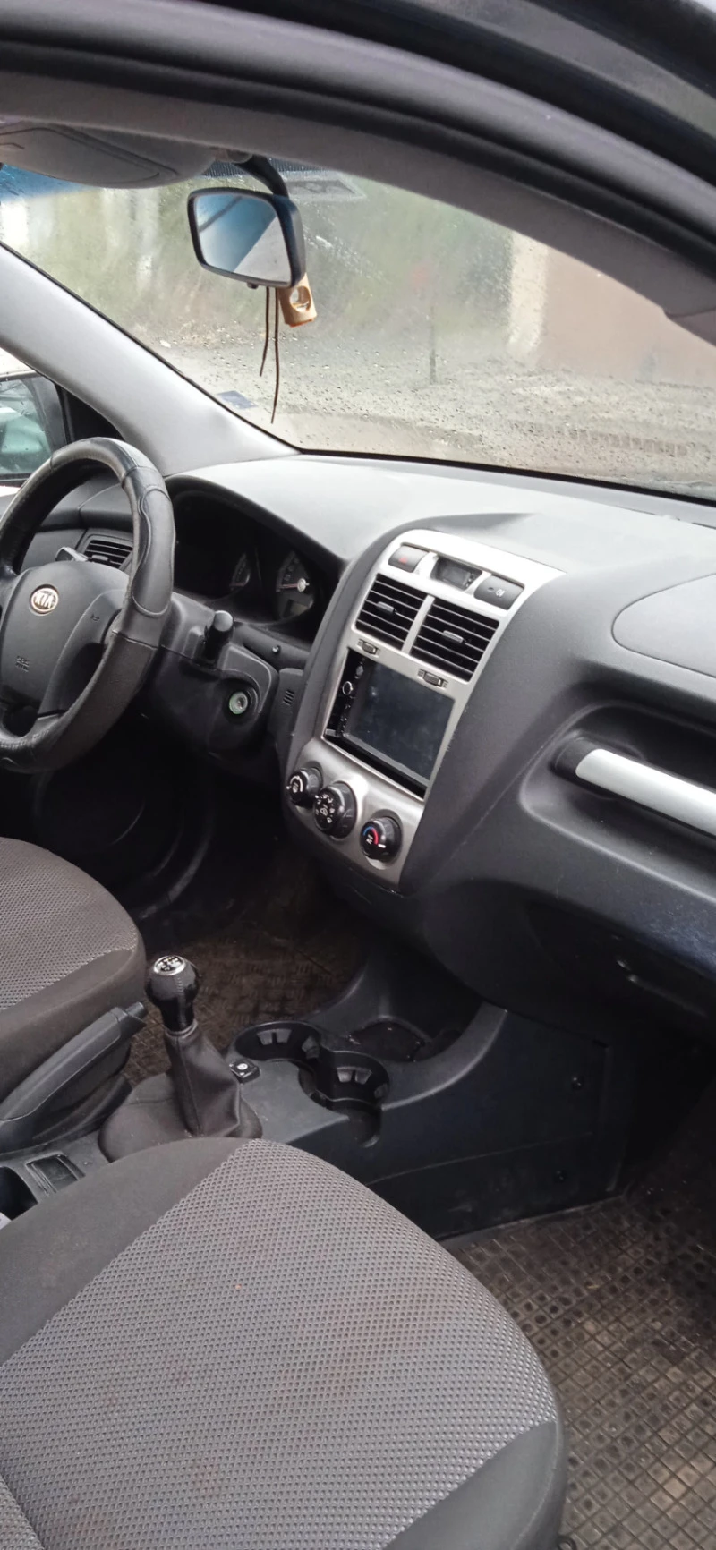 Kia Sportage, снимка 12 - Автомобили и джипове - 43096712