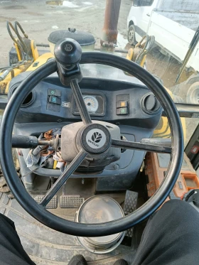 Багер New Holland LB110, снимка 10