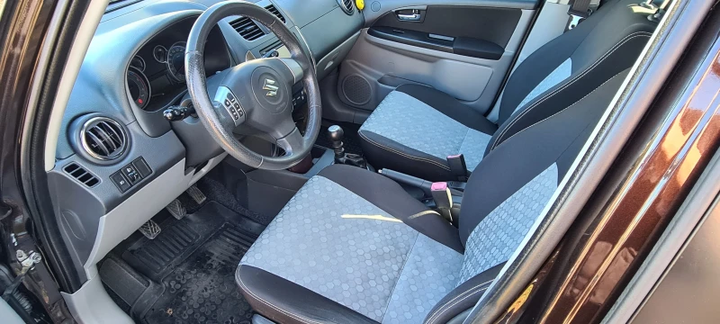 Suzuki SX4, снимка 11 - Автомобили и джипове - 52440596