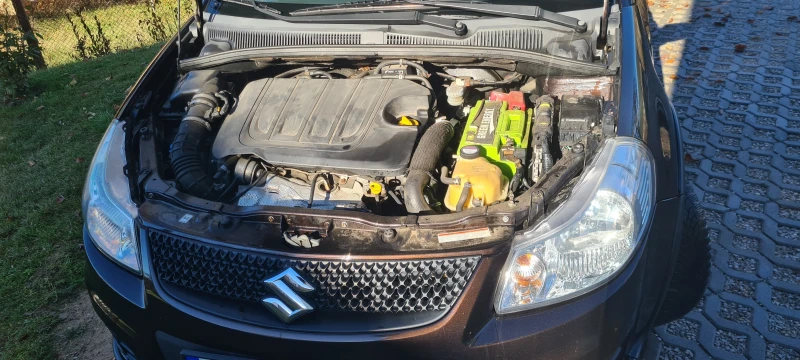 Suzuki SX4, снимка 14 - Автомобили и джипове - 52440596