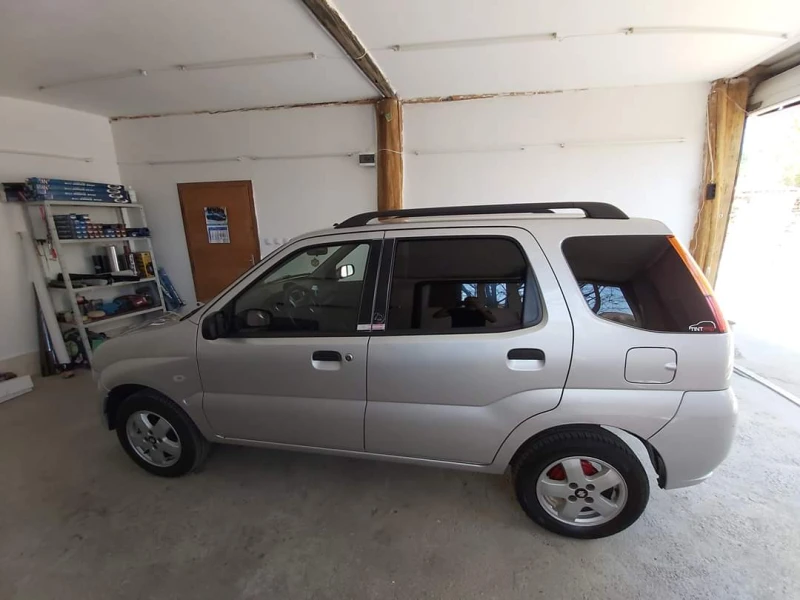 Suzuki Ignis 1.3 DDiS, снимка 9 - Автомобили и джипове - 52677582