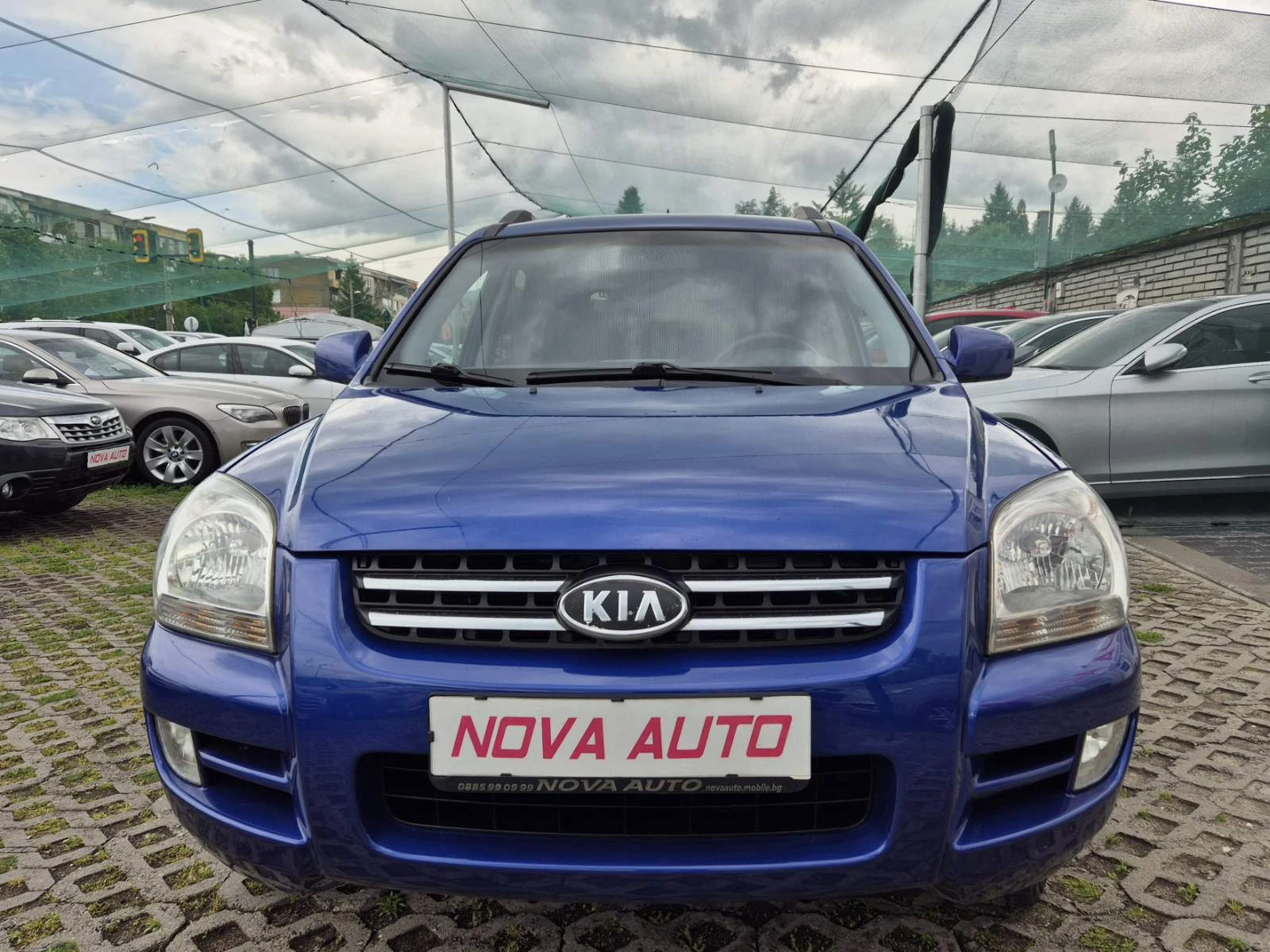 Kia Sportage 2.0D-AUTOMATIC-4X4 - изображение 6
