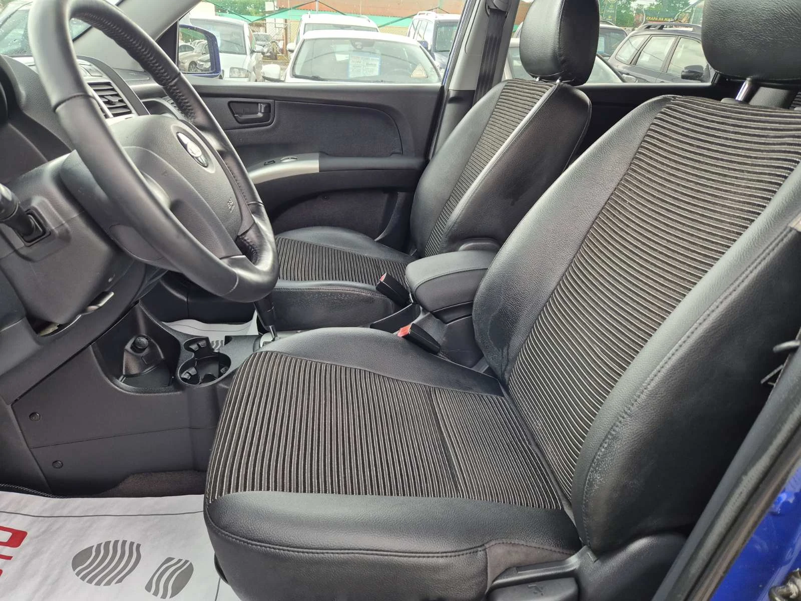 Kia Sportage 2.0D-AUTOMATIC-4X4 - изображение 7
