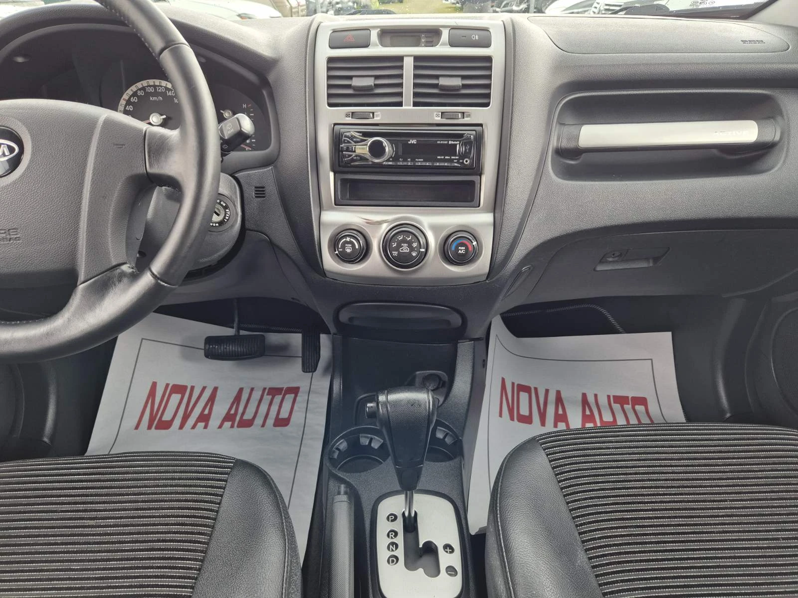 Kia Sportage 2.0D-AUTOMATIC-4X4 - изображение 8