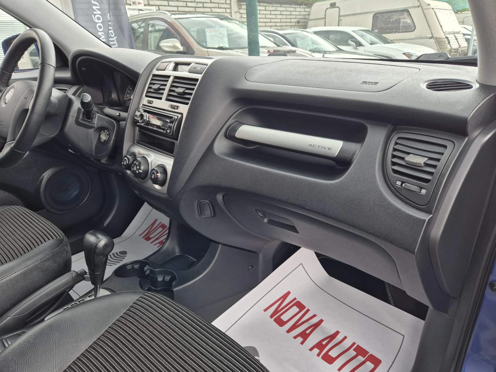Kia Sportage 2.0D-AUTOMATIC-4X4 - изображение 9