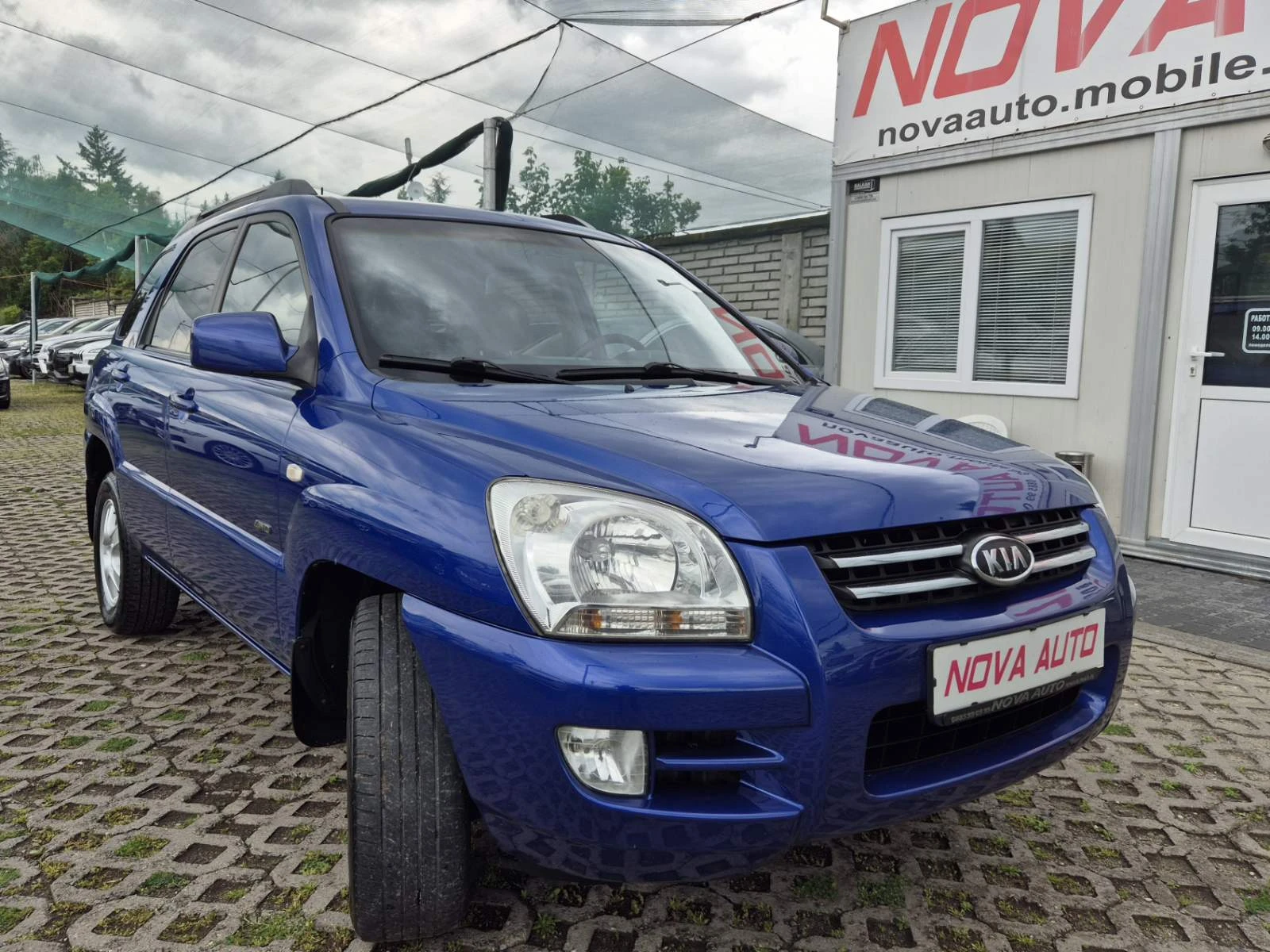 Kia Sportage 2.0D-AUTOMATIC-4X4 - изображение 5