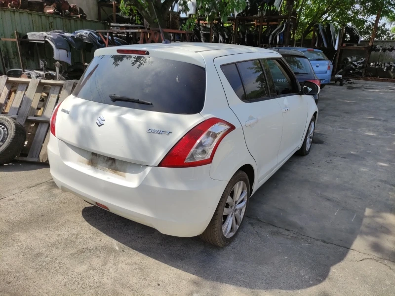 Suzuki Swift 1.3i, снимка 4 - Автомобили и джипове - 39858171