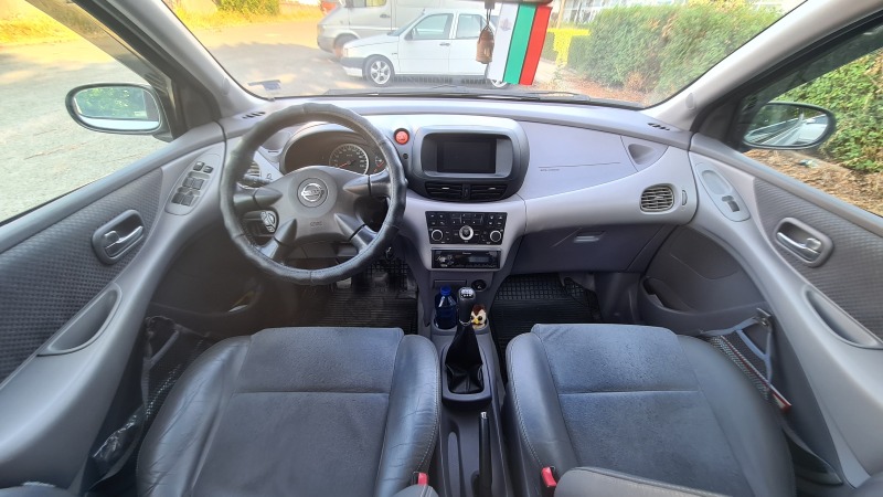 Nissan Almera tino, снимка 11 - Автомобили и джипове - 46603159