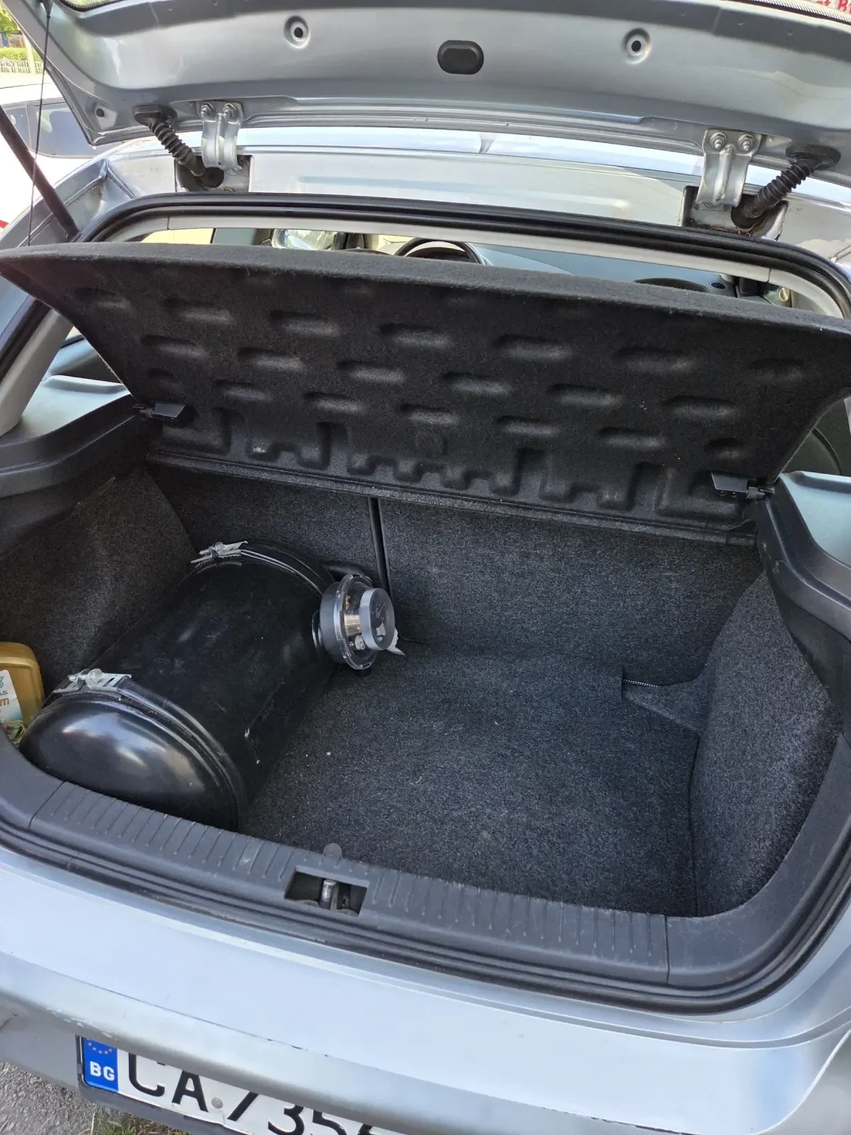 Seat Ibiza 1.4 газова уредба, снимка 10 - Автомобили и джипове - 54600643