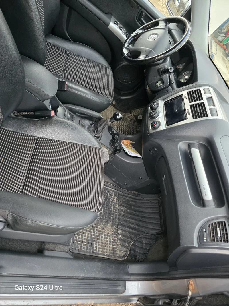 Kia Sportage 2.0 LPG, снимка 10 - Автомобили и джипове - 48770447