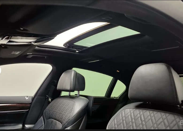 BMW 740 Ld * M-Package* * HeadUp* AвтоКредит* (ЦЕНА ДО БГ), снимка 17 - Автомобили и джипове - 53276191