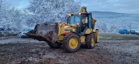 Багер Komatsu WB97S - изображение 1
