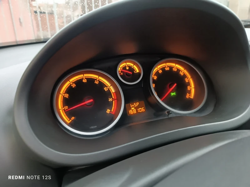 Opel Corsa 1.2i, снимка 11 - Автомобили и джипове - 49304711