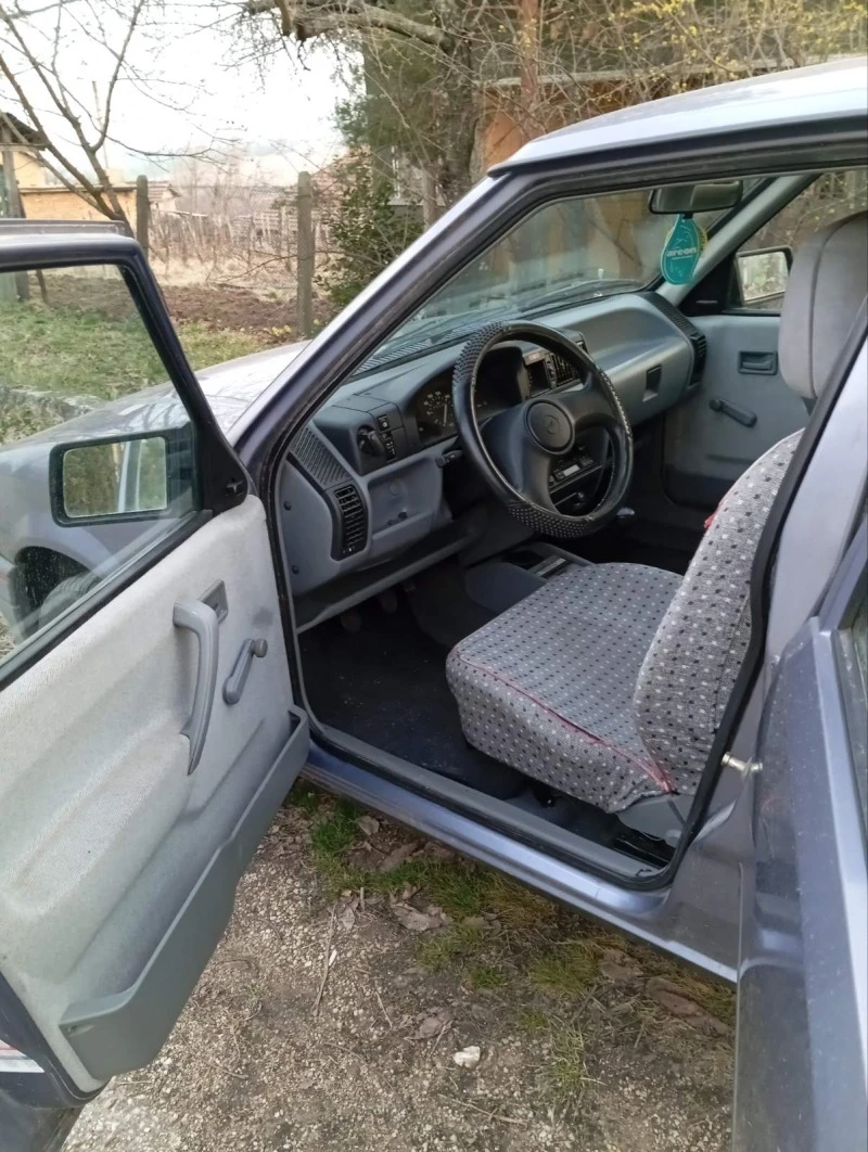 Opel Corsa, снимка 6 - Автомобили и джипове - 47458423