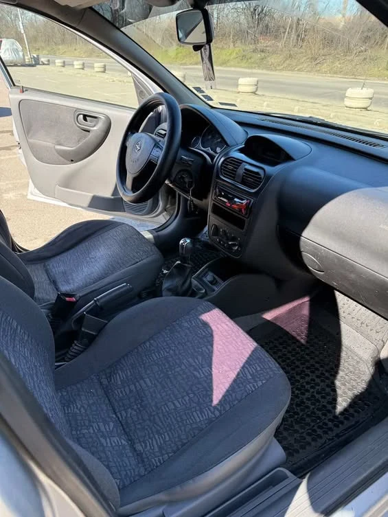 Opel Corsa 1.2 Бензин / Газ , снимка 10 - Автомобили и джипове - 53669945