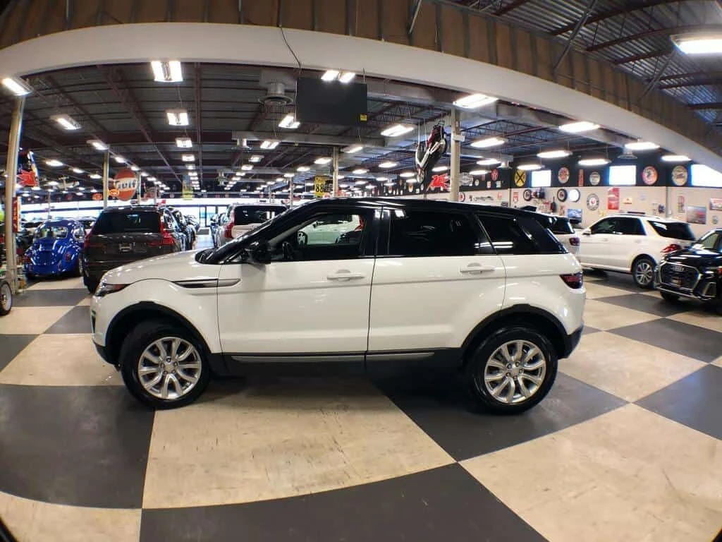 Land Rover Range Rover Evoque * SE AWD LEATHER PAN/ROOF NAV B/SPOT L/ASSIST CAME, снимка 6 - Автомобили и джипове - 54093983