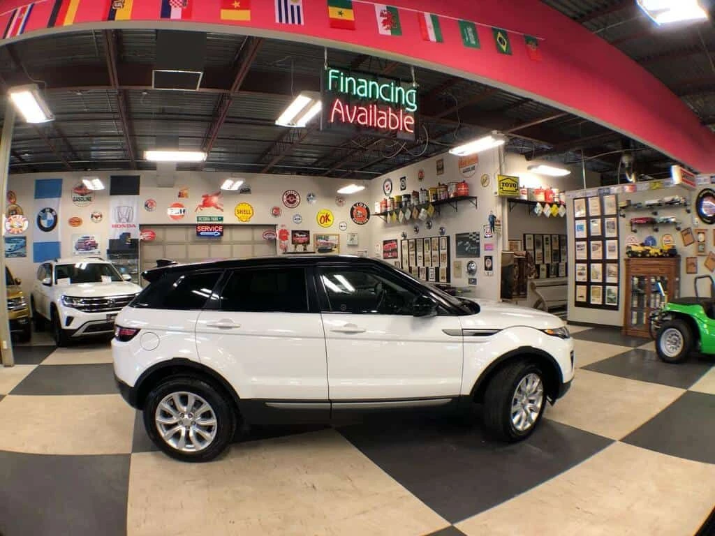 Land Rover Range Rover Evoque * SE AWD LEATHER PAN/ROOF NAV B/SPOT L/ASSIST CAME, снимка 9 - Автомобили и джипове - 54093983