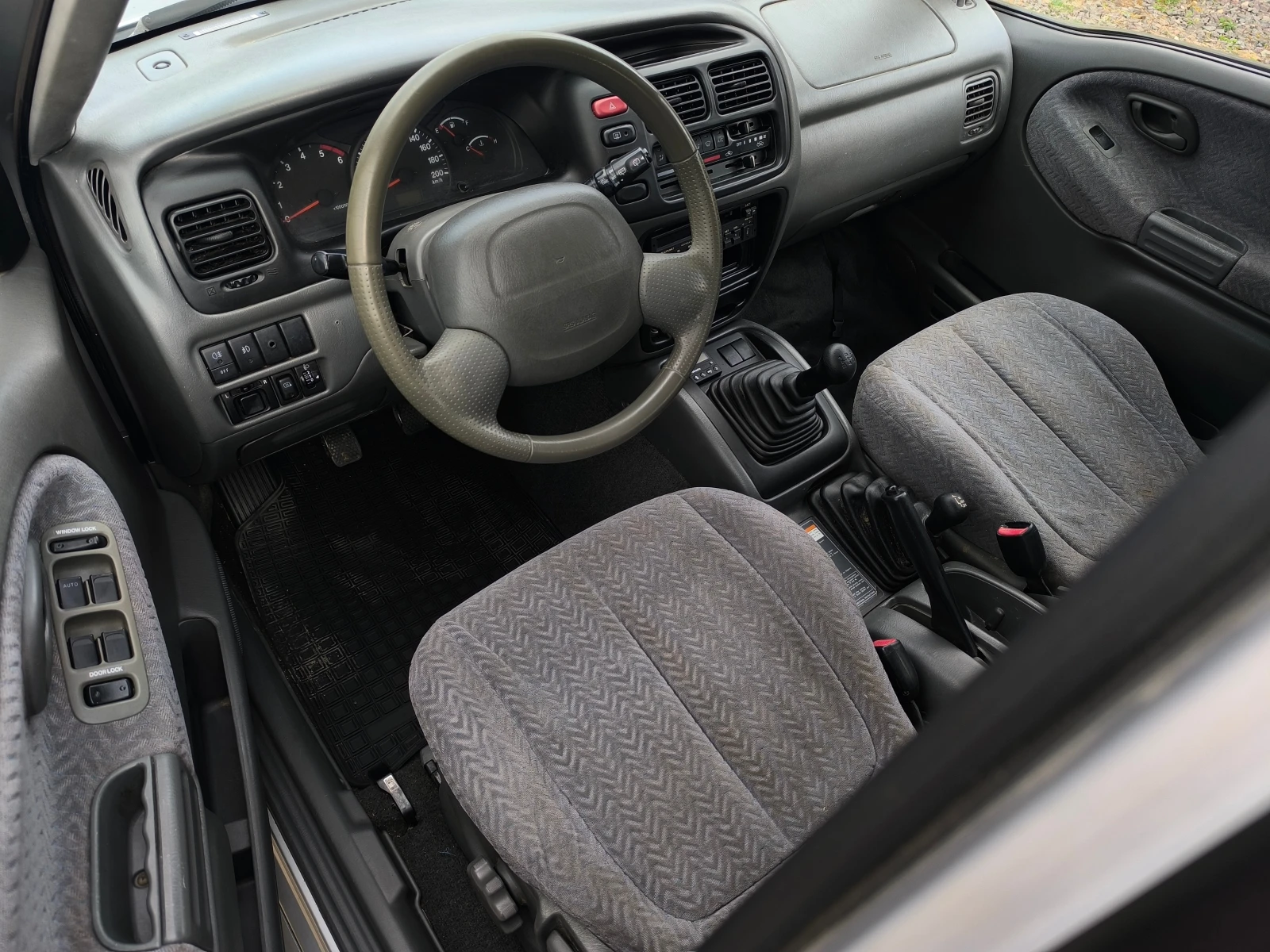 Suzuki Grand vitara -2.0HDI-110кс-4х4-КЛИМАТИК-ОТЛИЧНА !!!, снимка 10 - Автомобили и джипове - 56200758