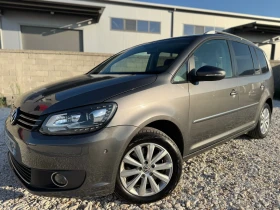 Обява за продажба на VW Touran 2.0 TDI / LED / HIGHLINE / NAVI / PARKTRONIC   ~14 500 лв. - изображение 1