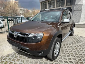 Dacia Duster 1.6i 4WD, снимка 1