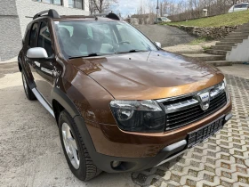 Dacia Duster 1.6i 4WD, снимка 2