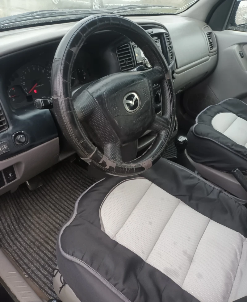 Mazda Tribute, снимка 10 - Автомобили и джипове - 48810136