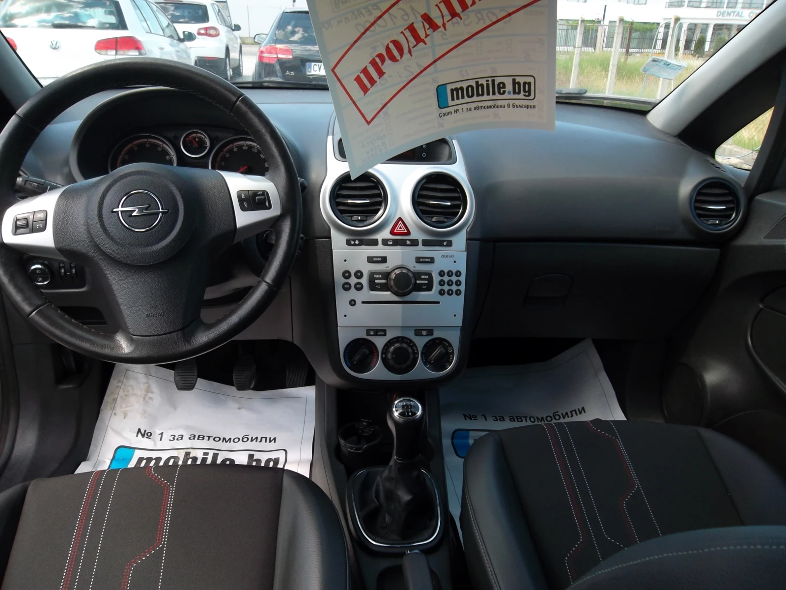 Opel Corsa 1.2i-70k.s , снимка 11 - Автомобили и джипове - 54800412