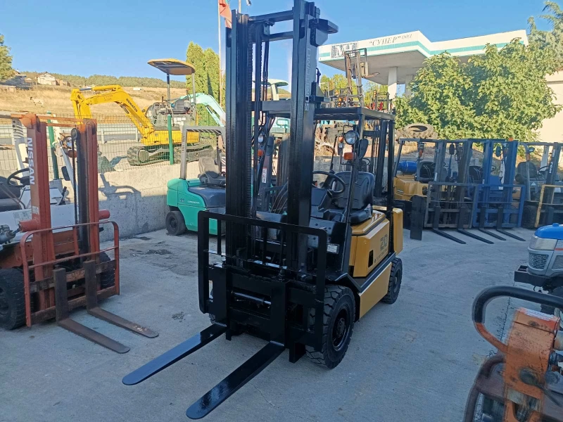 Мотокар Yale ДИЗЕЛ 2 ТОНА ИЗРАВНИТЕЛ, снимка 2 - Индустриална техника - 51769642