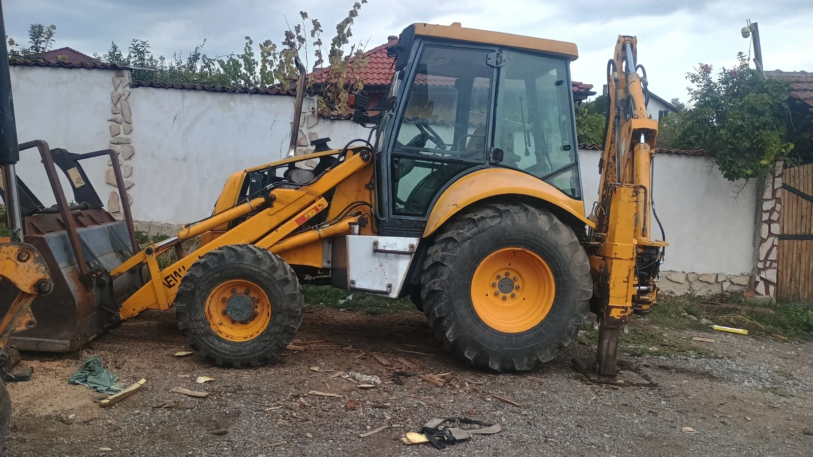 Багер New Holland 95 - изображение 2