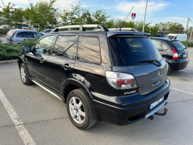 Mitsubishi Outlander 2.4i, снимка 4 - Автомобили и джипове - 45285739