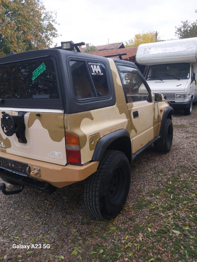 Suzuki Vitara 1.6 , снимка 9 - Автомобили и джипове - 52572751