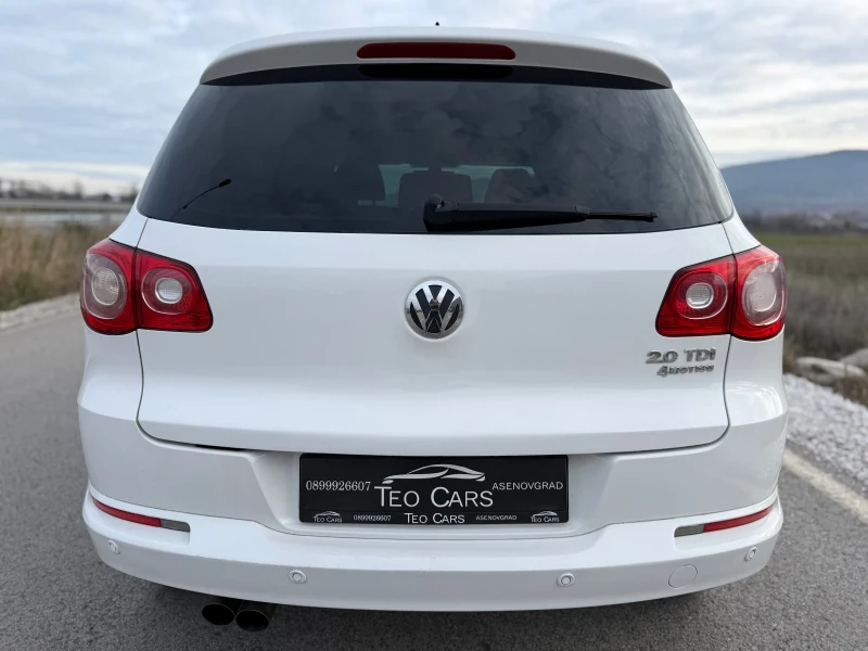 VW Tiguan 2.0 TDI / SPORT / 4MOTION / NAVI / XENON / PECHKA, снимка 6 - Автомобили и джипове - 52726635
