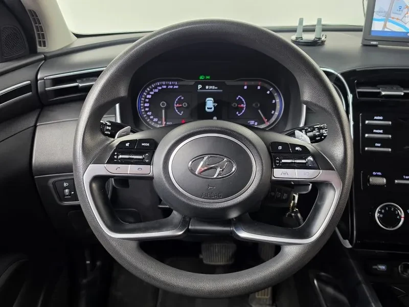 Hyundai Tucson 2.0 4Wd Modern, снимка 13 - Автомобили и джипове - 55651897