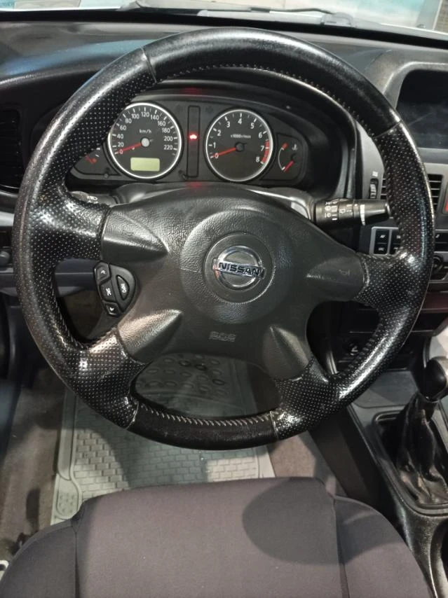 Nissan Almera 1.5i - изображение 8