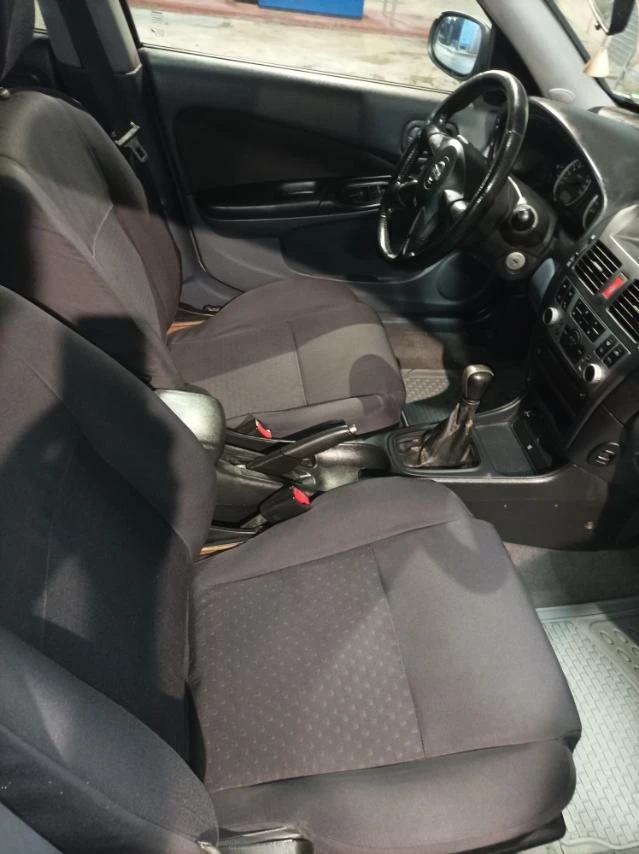 Nissan Almera 1.5i, снимка 11 - Автомобили и джипове - 53125336