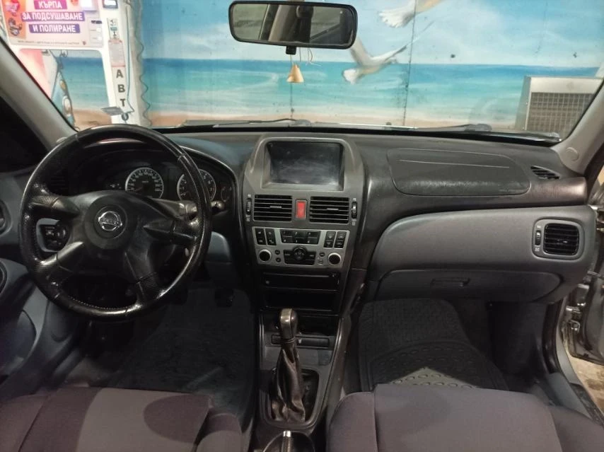 Nissan Almera 1.5i - изображение 9