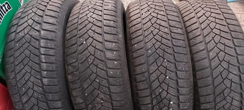 Гуми Зимни 215/65R16, снимка 1 - Гуми и джанти - 30924249