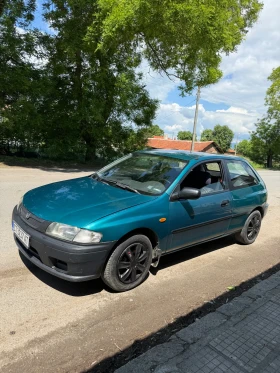 Обява за продажба на Mazda 323 1.3 ~1 900 лв. - изображение 1