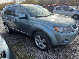 Обява за продажба на Mitsubishi Outlander 2.4 4x4 ~9 999 лв. - изображение 1 | Auto.bg Обява за продажба на Mitsubishi Outlander 2.4 4x4 ~9 999 лв. - изображение 1