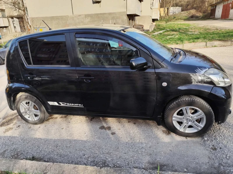 Daihatsu Sirion 1.3 4x4, снимка 6 - Автомобили и джипове - 49496393