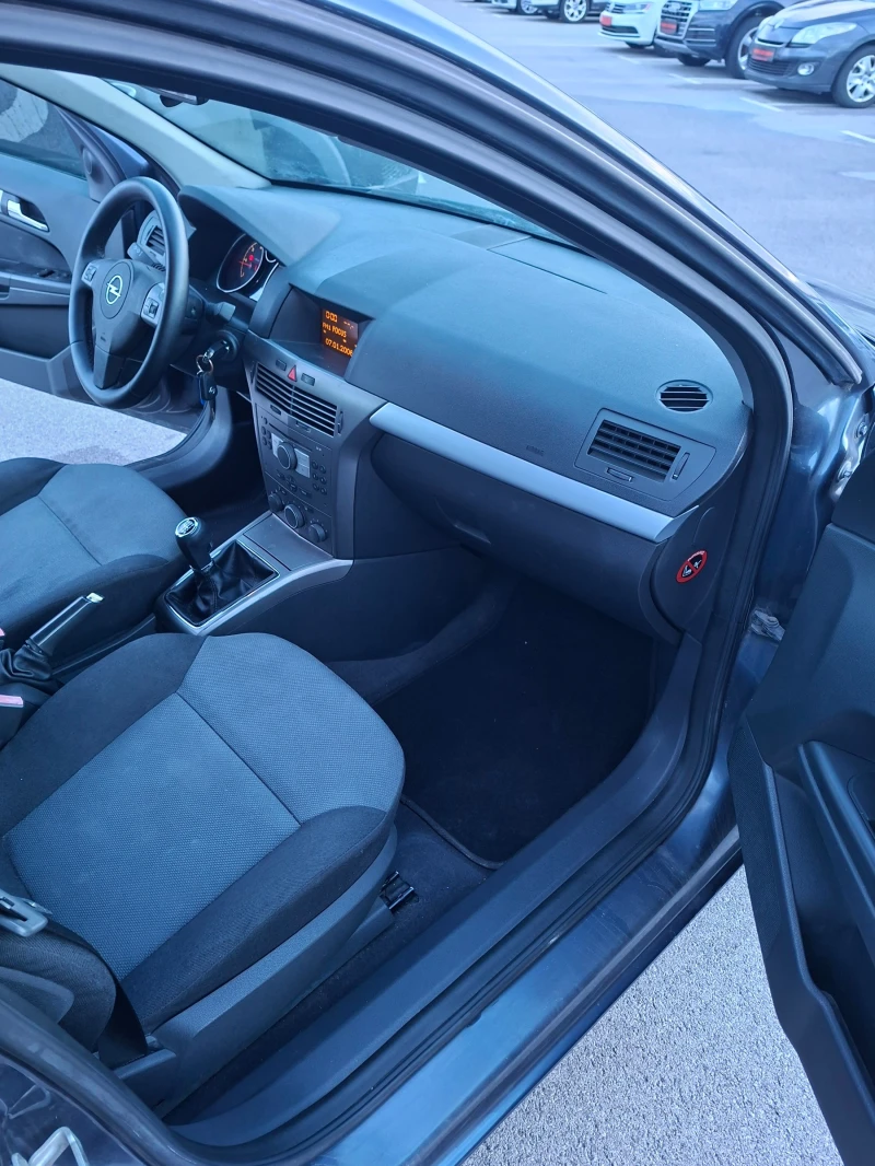 Opel Astra 1.3 TDCi 6 скорости, снимка 13 - Автомобили и джипове - 52503640