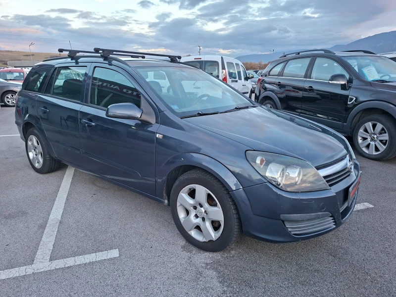 Opel Astra 1.3 TDCi 6 скорости, снимка 8 - Автомобили и джипове - 52503640