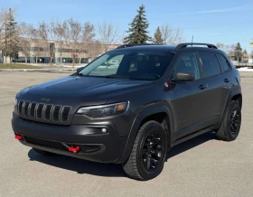 ������ Jeep Cherokee