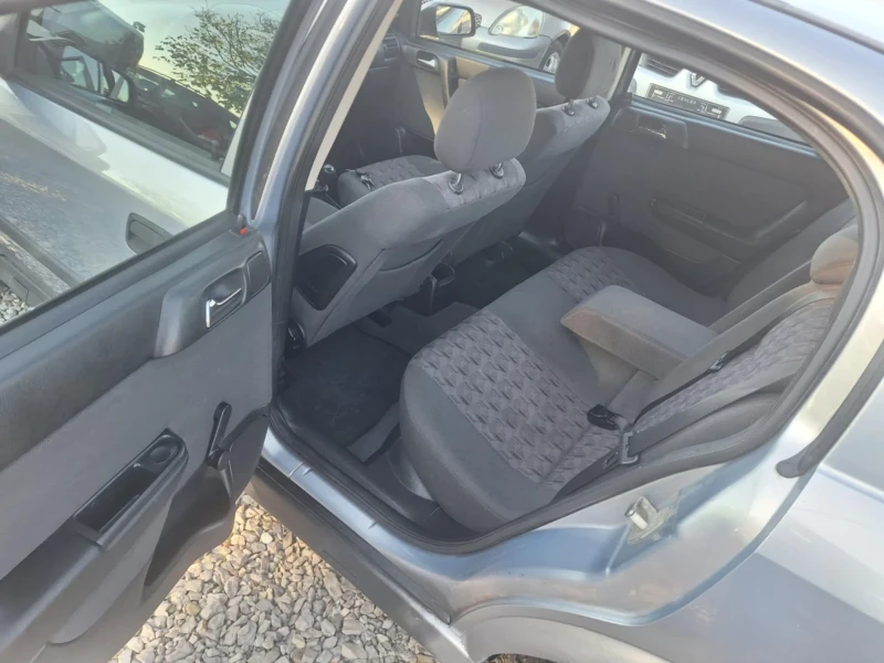 Opel Astra 1.2i 75ks, снимка 11 - Автомобили и джипове - 47800049