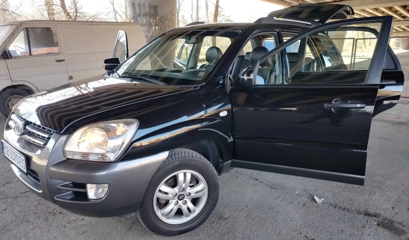 Kia Sportage 2.0i -Бензин, снимка 16 - Автомобили и джипове - 49602012