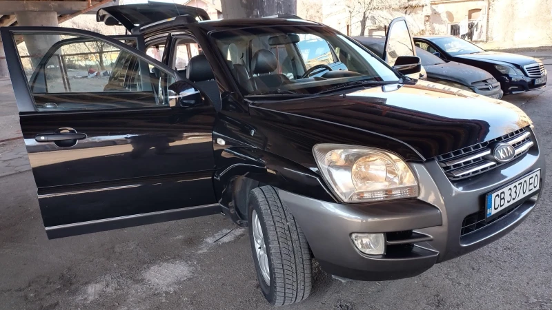 Kia Sportage 2.0i -Бензин, снимка 15 - Автомобили и джипове - 49602012