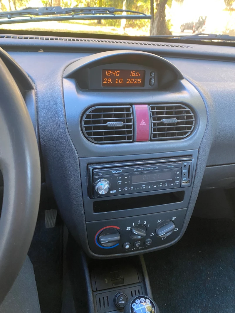 Opel Corsa 1.0 Климатик, снимка 15 - Автомобили и джипове - 52244195