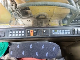 Багер Caterpillar M318C, снимка 6