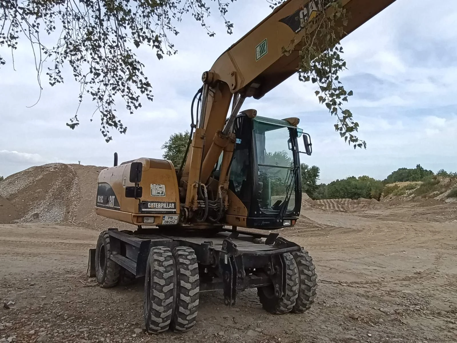 Багер Caterpillar M318C