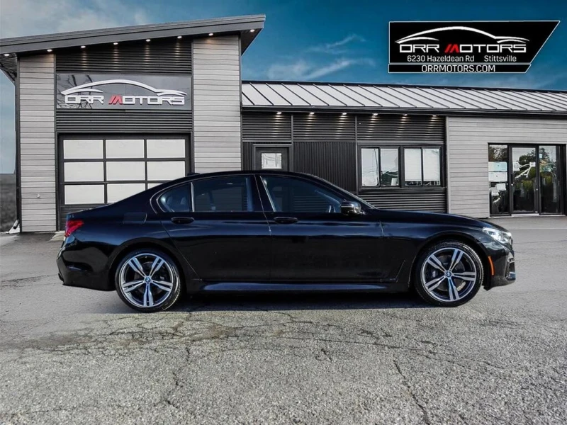 BMW 750 * V8 AWD | EXEC PKG | TECH PKG | ALCANTARA | NAV *, снимка 3 - Автомобили и джипове - 52978507